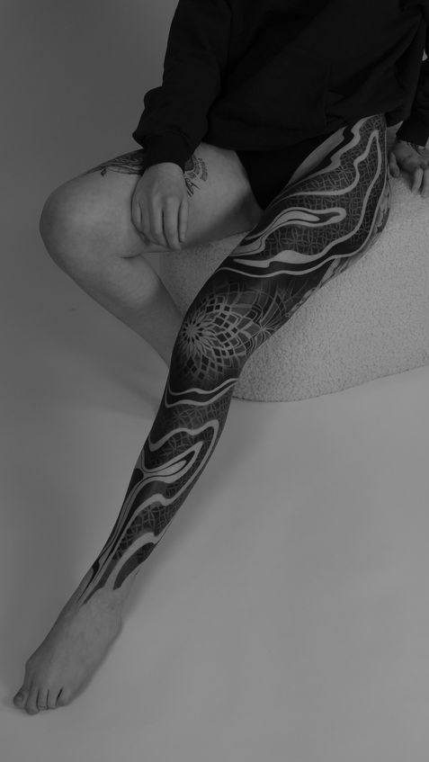 Tattoo on the leg.