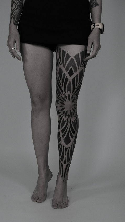 Tattoo on the leg.