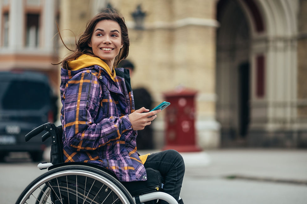 Young beautiful woman with disability who uses a wheelchair