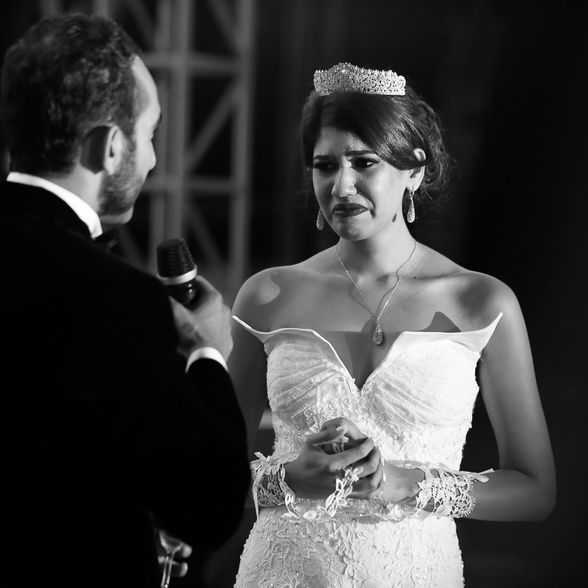 Bride crying during her wedding toast.