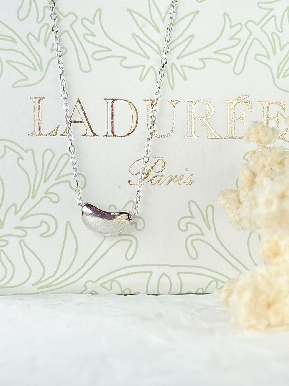 Thumbnail: Minimalist Silver Bean-Shaped Pendant Necklace