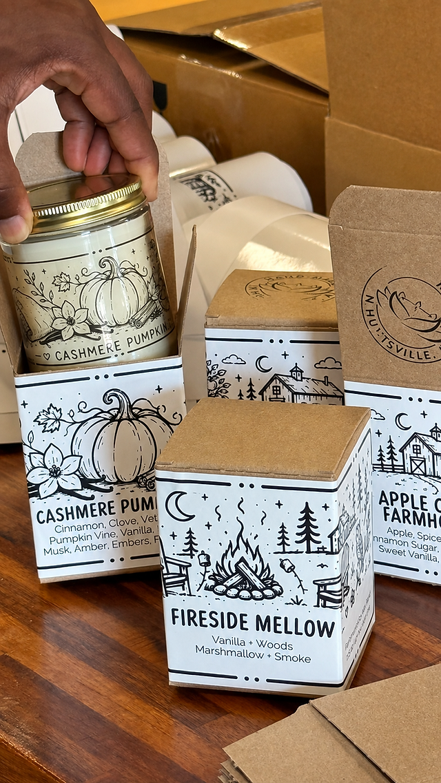 boxing up three Fall collection candles