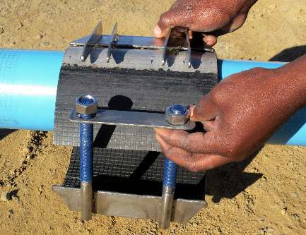 Wrap the clamp around the pipe.
