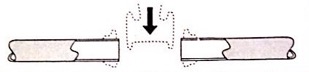 The fitting is shown entering the gap between two pipe ends.