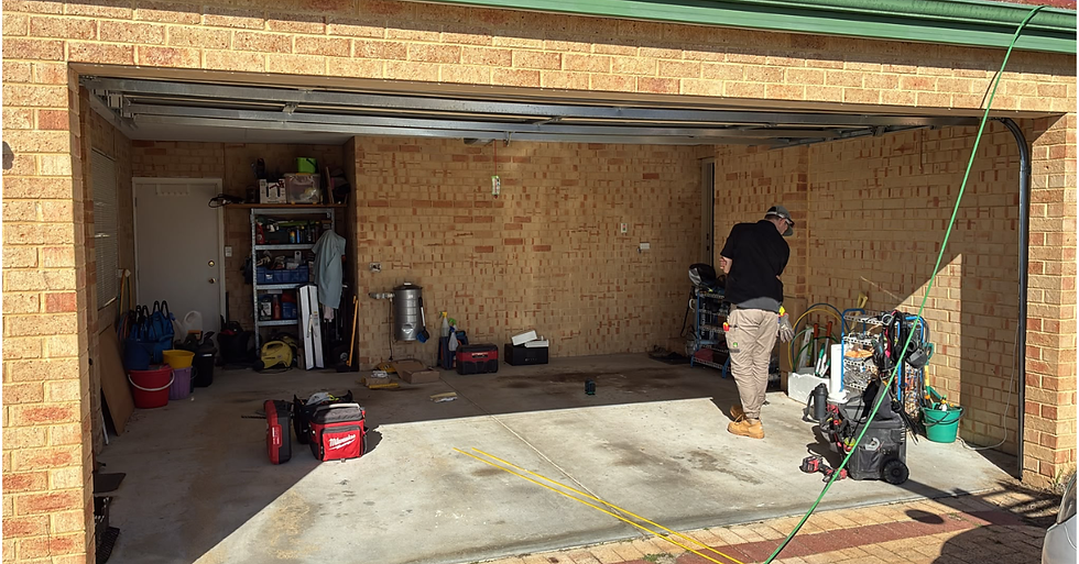 Switched On WA electrician working on wiring in a Perth home garage