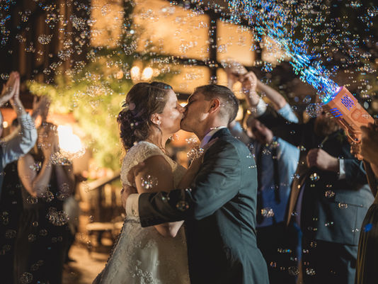 a wedding send-off with bubbles