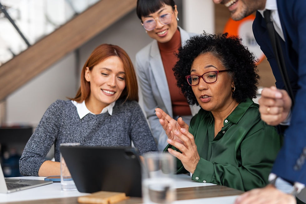 A team collaborating at a coworking space in Bangkok