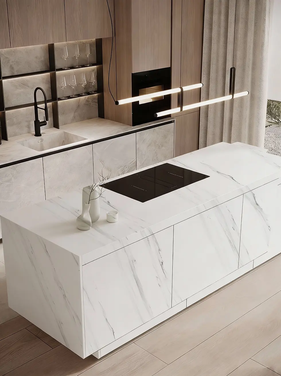 Modern kitchen with a marble island, sleek black stove, and vase decor. Wood cabinets, wine glasses, and pendant lights create a chic vibe.