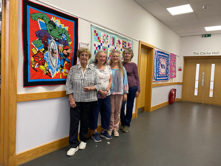 Pilgrim Quilters Take Our Charity Quilts into the Community