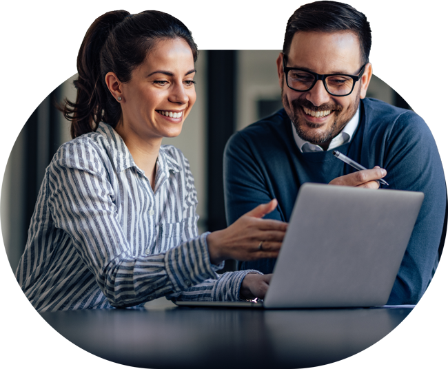 Colleagues working together on a laptop