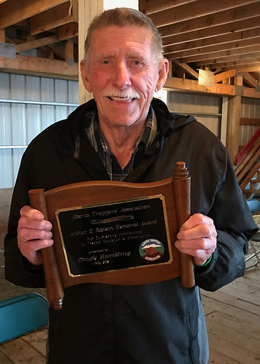 Chuck receiving an award