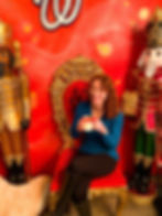 Laughing next to nutcrackers