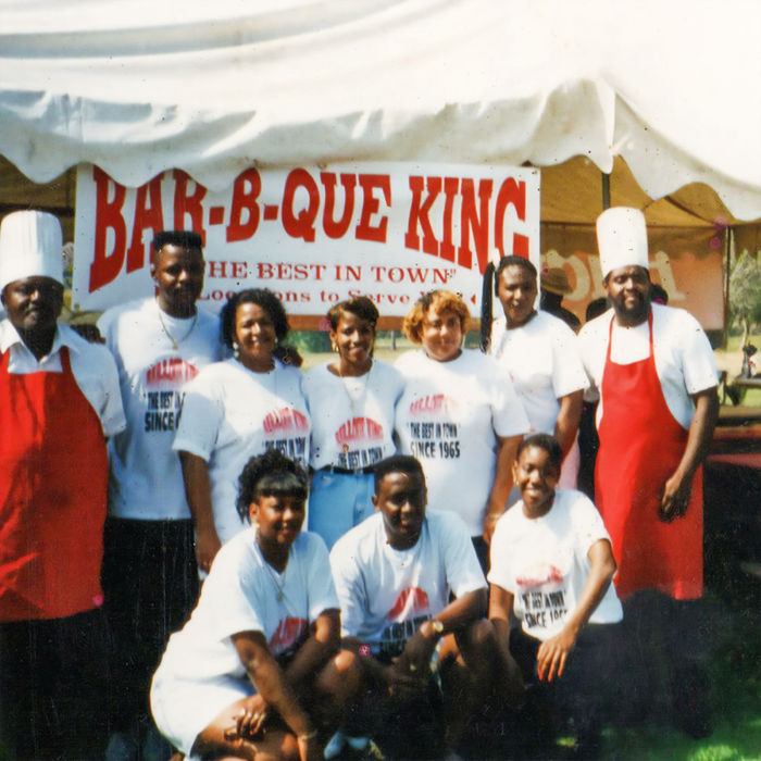 Bar-B-Que King employees and supporters pose for a picture.