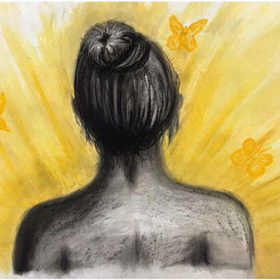 Back of a woman in black in white with a yellow glow emanating from her chest.