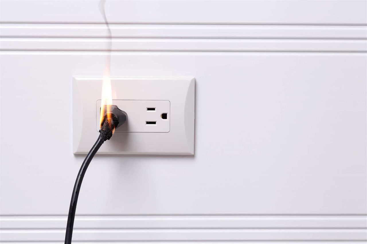 electric plug wire is getting on fire
