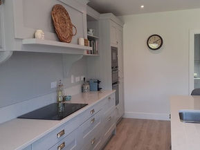 Modern kitchen design: gray cabinets, quartz countertops