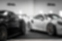 black and white car in a show room