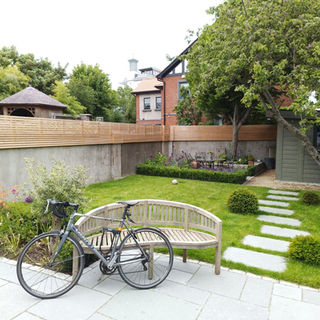 garden with bike and bench