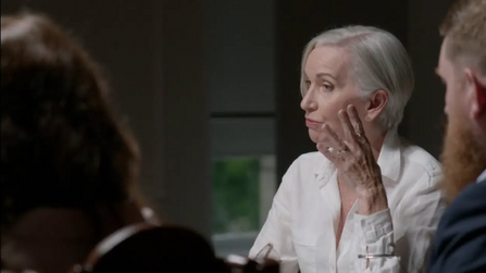 Woman talking with hand on face, Eoghan Hand Lighting, visible text.