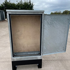 Galvanized metal cabinet with open door