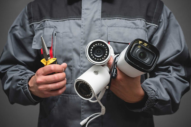 Repairman fixing CCTV cameras