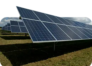 Rows of solar panels in a field providing renewable energy