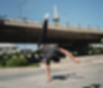 A man break dances in the street - what is hip hop dancing