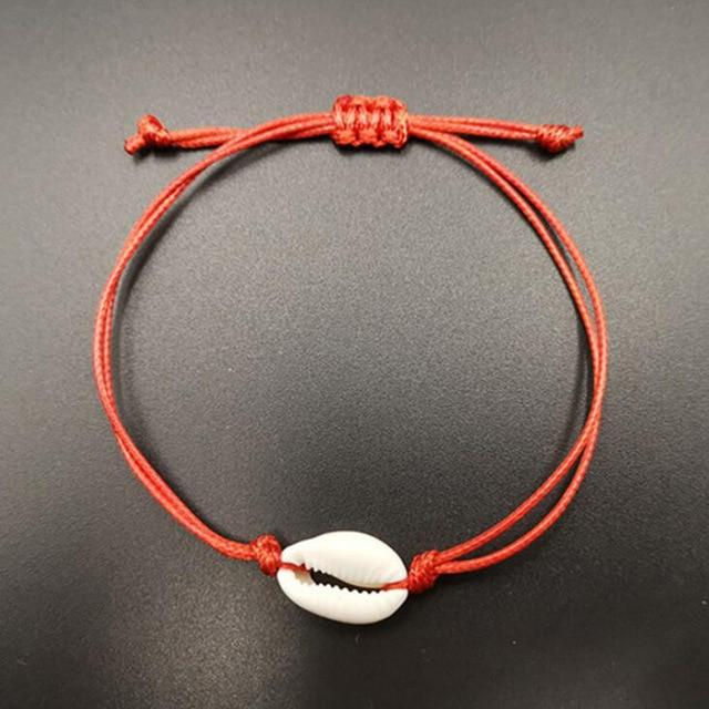 Thumbnail: Red string bracelet with a white shell charm, simple and elegant.