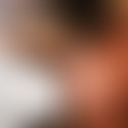 Thoughtful Black woman reflecting quietly on letting go and emotional healing