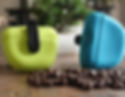 silicone dog treat pouches in green and blue with dog treats