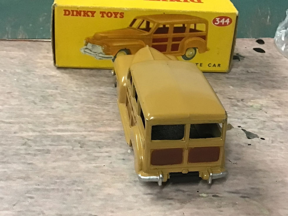 Thumbnail: Dinky 344 Plymouth Estate Car - tan body boxed
