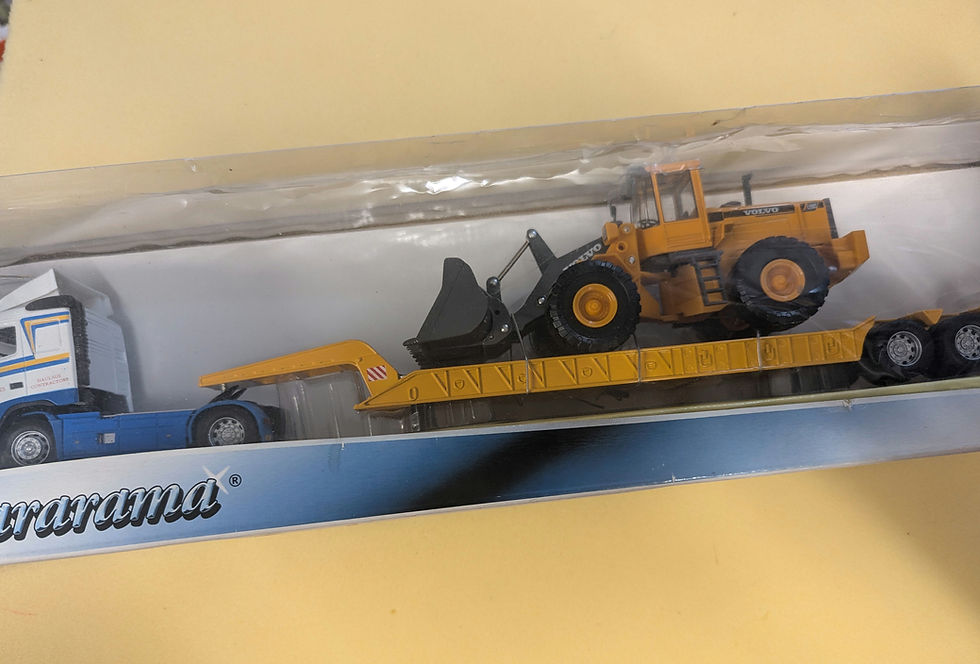 Thumbnail: Cararama 1/50 Scale no. 566 L150C Excavator On Volvo FH12 and Flatbed