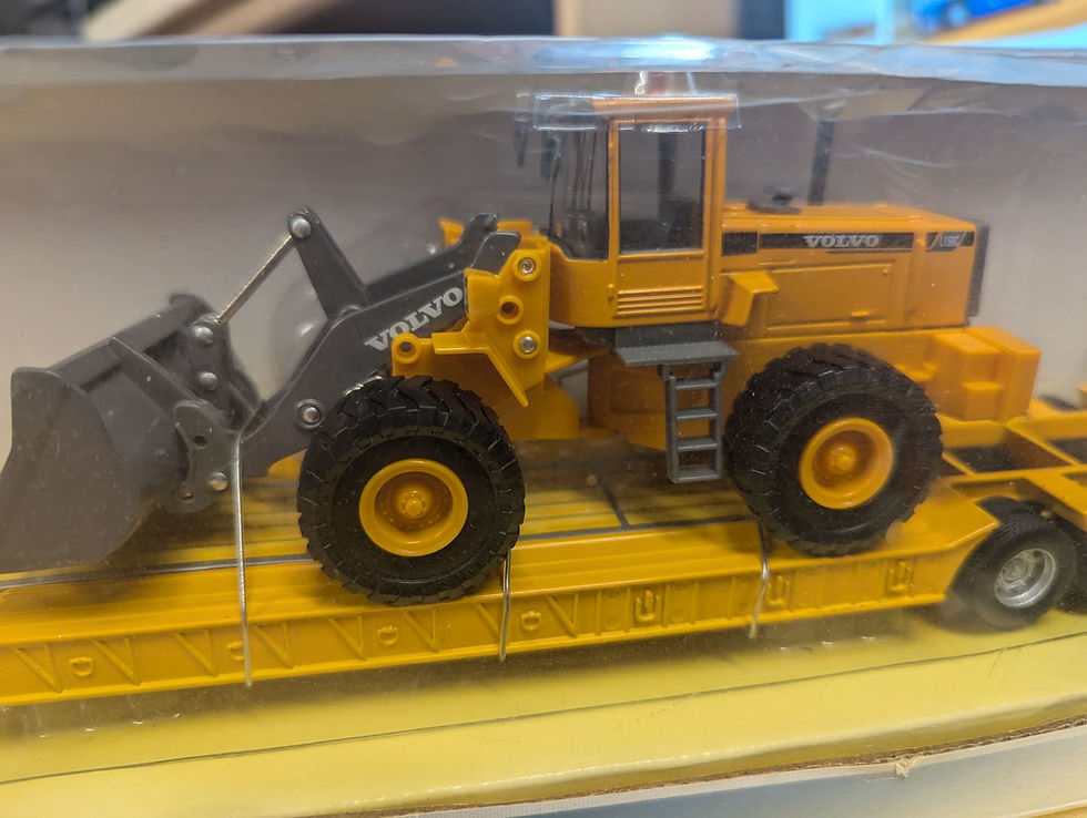 Thumbnail: Cararama 1/50 Scale no. 566 L150C Excavator On Volvo FH12 and Flatbed