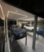 custom luxury car garage mirrors and glass garage door