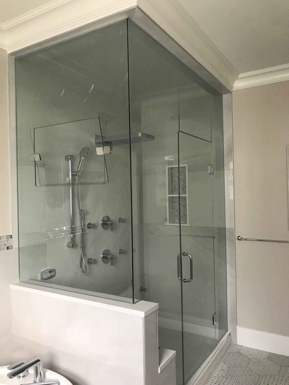 frameless-glass-shower-with-built-in-bench