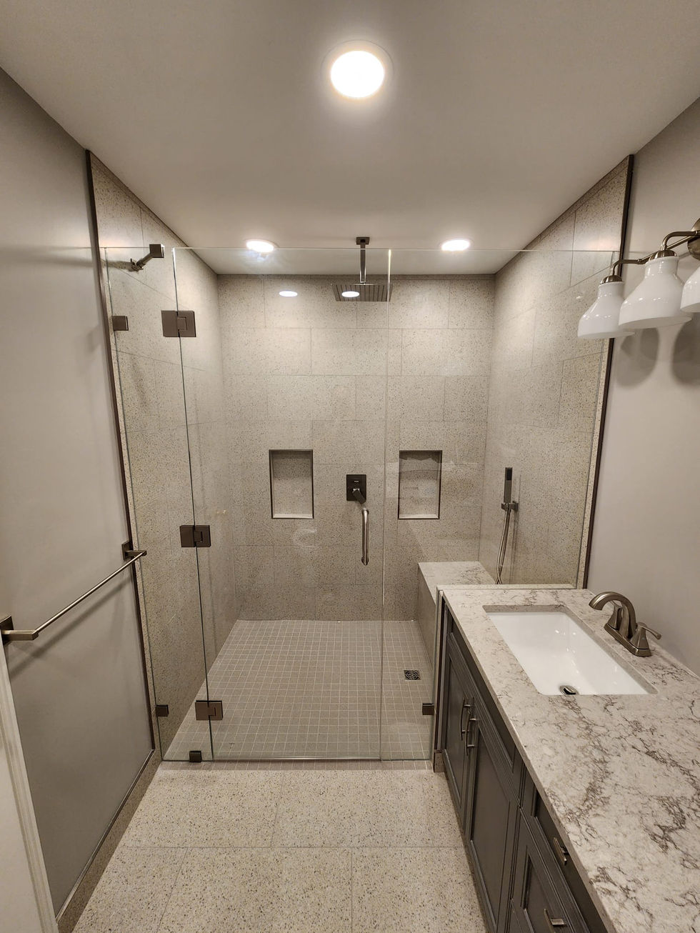 frameless-glass-shower-door-tile-bench