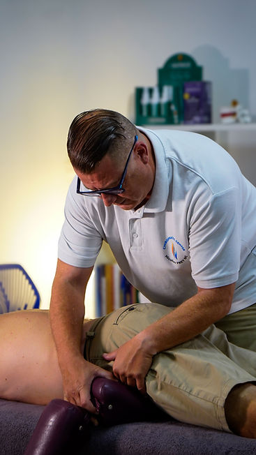 Chiropractor Nicolas Frey DC treating a patient at his clinic on the Costa Blanca South