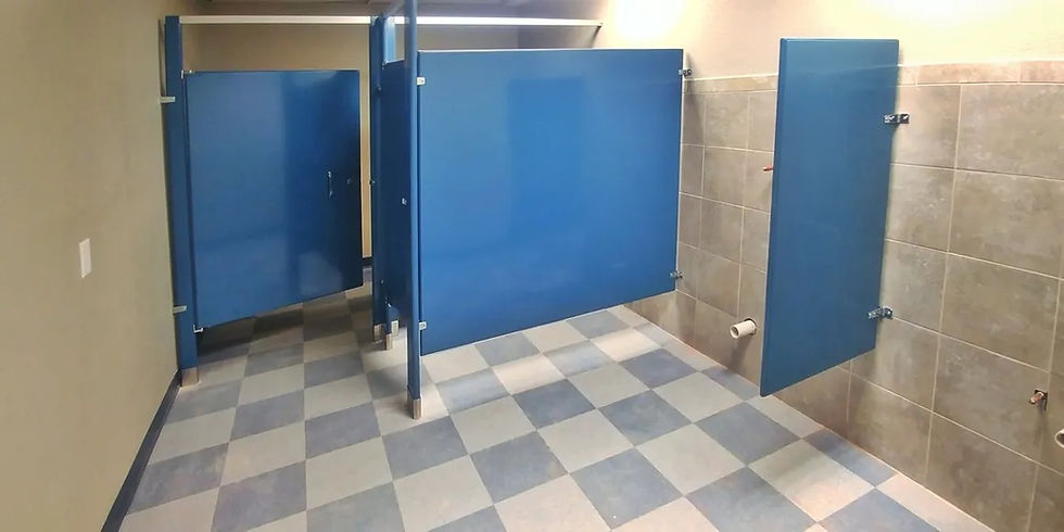 Blue commercial restroom stalls