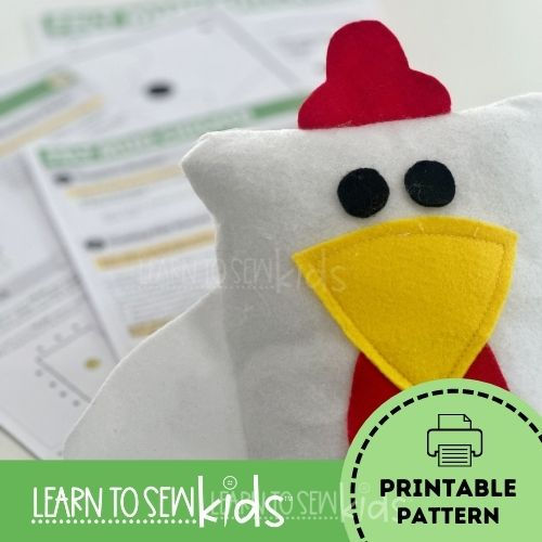 Thumbnail: white felt chicken with yellow felt beak with instruction in the background