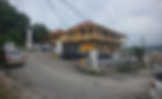Yellow building and painting in Lucea