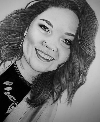 Graphite drawing of a girl smiling into the camera.