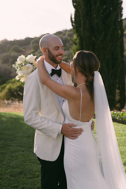 Photograph of the bride and groom taken at the wedding by Loise Golding, an editorial and documentary wedding photographer.