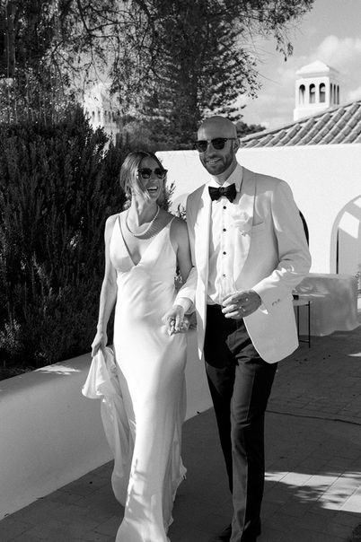 Photograph of the bride and groom taken at the wedding by Loise Golding, an editorial and documentary wedding photographer.