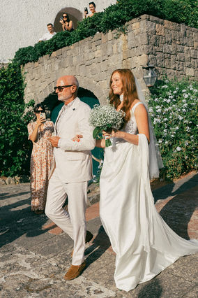 Photograph of the bride and groom taken at the wedding by Loise Golding, an editorial and documentary wedding photographer.