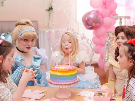 Children celebrating a magical half birthday party at the Fairytale Palace with princess-themed decorations, sparkling tea party details, sweet treats, and joyful moments designed for kids whose birthdays fall during holidays or difficult seasons.