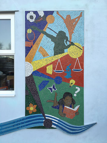 A beautiful mosaic made by Paul Siggins and the children of the school, in a school mosaic workshop.