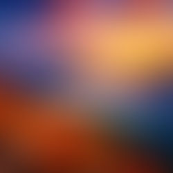 A breathtaking sunset bathes the mountain in a warm glow,