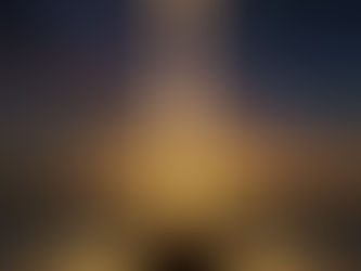 A silhouette meditates under a starlit sky, illuminated by a radiant beam connecting the cosmos to a glowing heart chakra