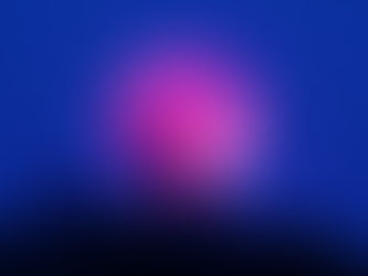 A luminous full moon rises over rugged mountain peaks,