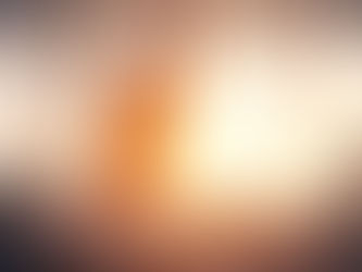 a person stretches in bed, bathed in the warm glow of sunrise